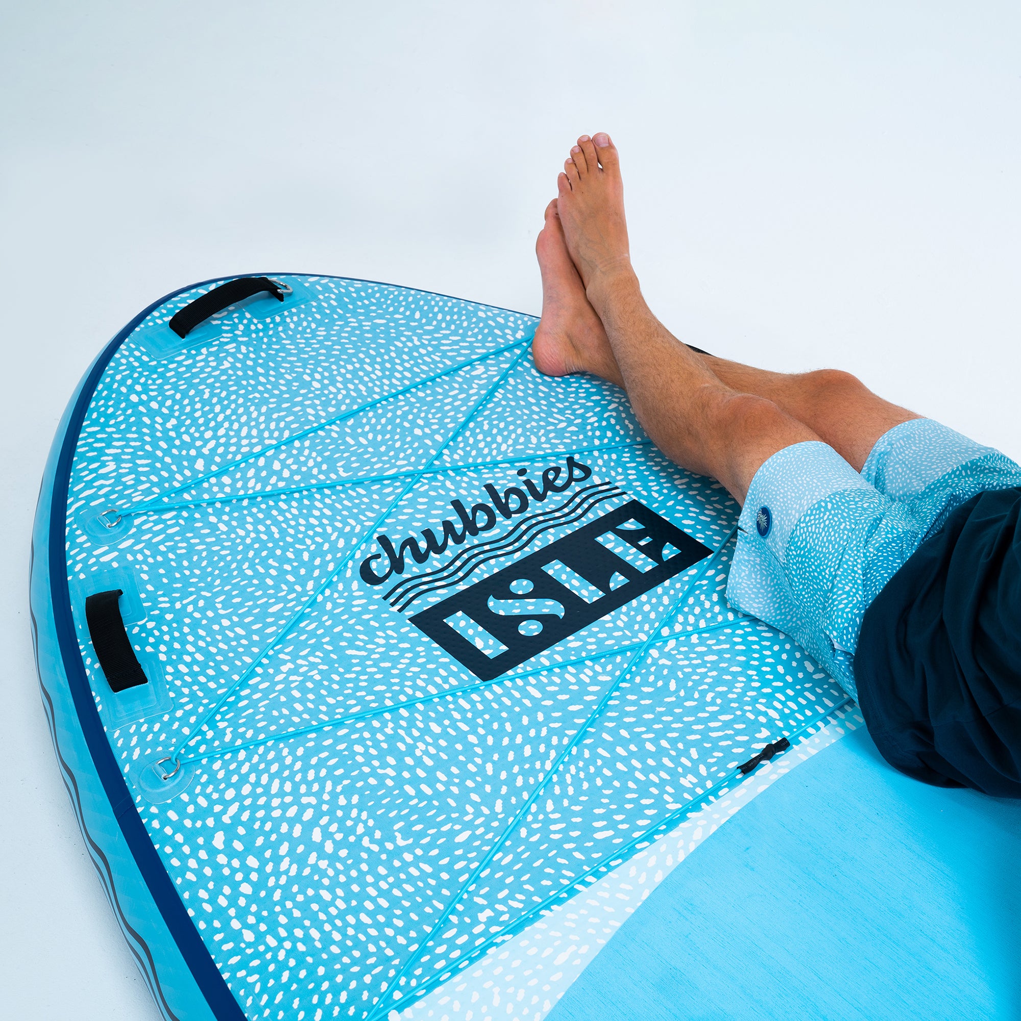 Man Laying On The Chubbies Whale Shark Megalodon Limited Edition Inflatable Paddle Board