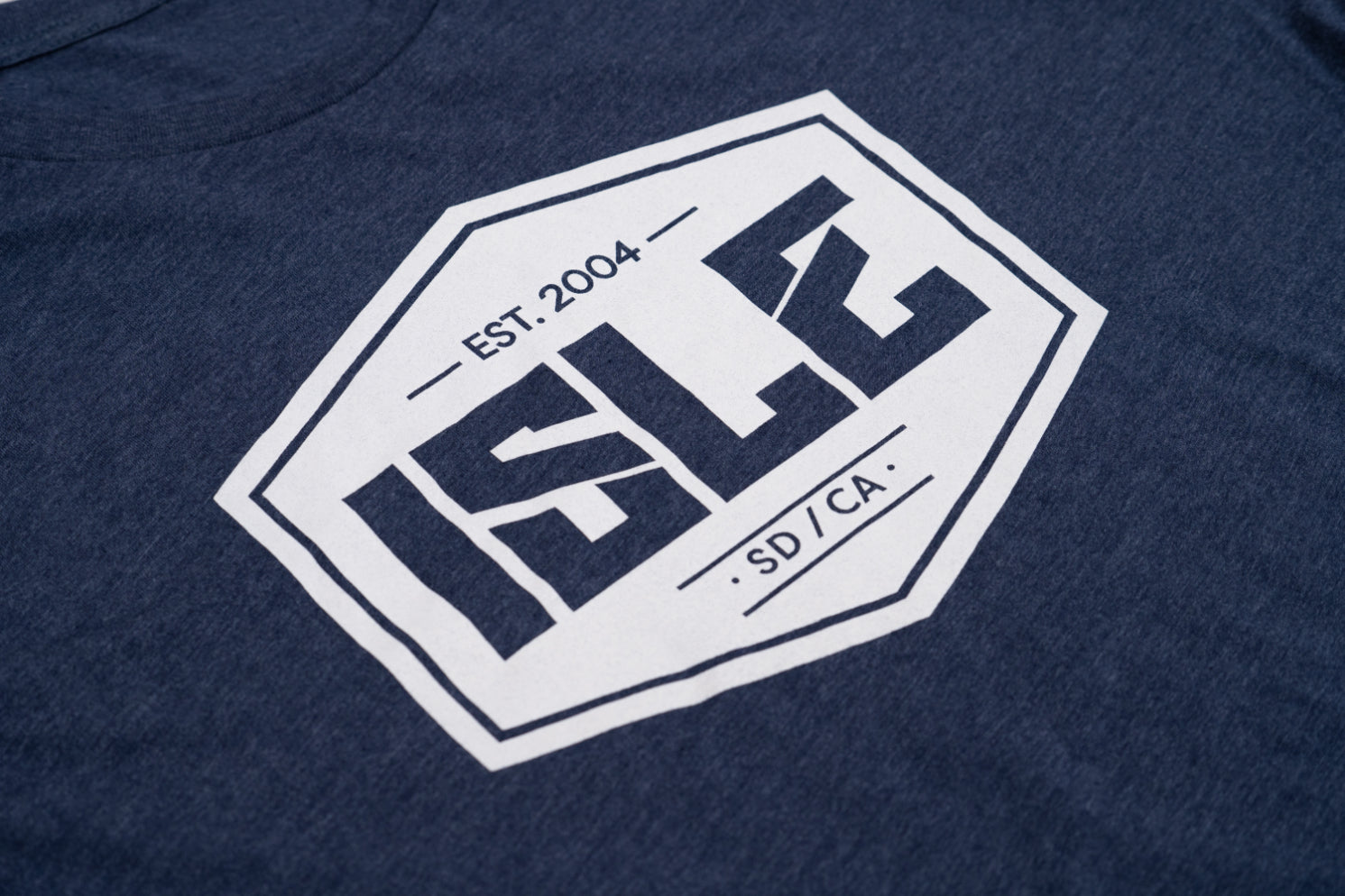 Close Up of Logo On The Retro Tee in Navy 